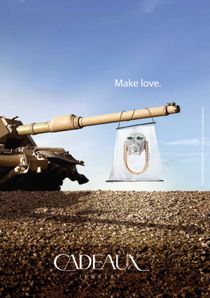 Cadeaux Jewelry Tank Ad, with Kult Ring Skull, fully set with diamonds.